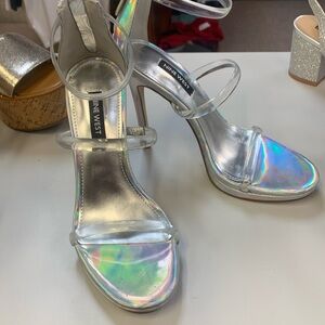 Iridescent clear strap hills.